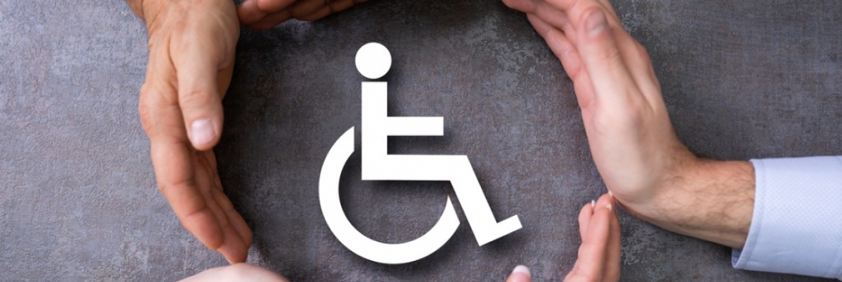 hands protecting wheelchair